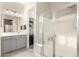 This bathroom offers a glass shower, and a vanity area with good natural lighting at 7533 S Woodchute Dr, Gold Canyon, AZ 85118
