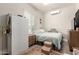 This bedroom features a tv, a rug, and a small closet at 7533 S Woodchute Dr, Gold Canyon, AZ 85118