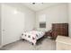 This bedroom features a closet, a side table, and a dresser at 7533 S Woodchute Dr, Gold Canyon, AZ 85118