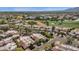 Aerial view of neighborhood with desert landscaping, golf course, community pool and other amenities at 7740 E Gainey Ranch Rd # 36, Scottsdale, AZ 85258