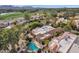 Backyard pool and patio area with desert landscaping at 7740 E Gainey Ranch Rd # 36, Scottsdale, AZ 85258