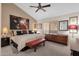 Spacious bedroom with a ceiling fan, modern furnishings, and a neutral color scheme at 7740 E Gainey Ranch Rd # 36, Scottsdale, AZ 85258