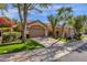 Charming single-story home with a two-car garage, well-manicured lawn and beautiful desert landscaping at 7740 E Gainey Ranch Rd # 36, Scottsdale, AZ 85258