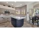 Kitchen with a large center island, ample counter space, and natural lighting at 7740 E Gainey Ranch Rd # 36, Scottsdale, AZ 85258