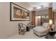 Relaxing sitting area with soft lighting, comfortable chaise lounge, and neutral color palette at 7740 E Gainey Ranch Rd # 36, Scottsdale, AZ 85258