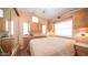 Bedroom with generous built-in storage and light from multiple windows at 834 S Beryl Dr, Apache Junction, AZ 85119