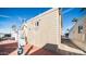 Rear exterior view of home highlighting the siding, roofline, and outdoor space at 834 S Beryl Dr, Apache Junction, AZ 85119