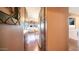Hallway with wood floors leading to the living room at 834 S Beryl Dr, Apache Junction, AZ 85119