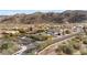 Residential neighborhood surrounded by desert landscape, mountains and mature trees at 9001 S 18Th Way, Phoenix, AZ 85042