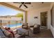 Outdoor seating area with comfortable furniture and a pool view at 9001 S 18Th Way, Phoenix, AZ 85042
