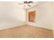 Bedroom featuring a ceiling fan, carpet and a window at 9001 S 18Th Way, Phoenix, AZ 85042