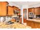 Gourmet kitchen with granite countertops, stainless steel appliances, and a pantry at 9001 S 18Th Way, Phoenix, AZ 85042