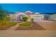 Beautiful single-Gathering home features stone accents, desert landscaping, and a spacious two-car garage at 9388 W Cashman Dr, Peoria, AZ 85383