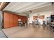 Spacious garage with storage cabinets and shelving, offering ample space for vehicles and projects at 12715 W Crestvale Dr, Peoria, AZ 85383