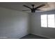 Bedroom with a ceiling fan and a window at 13839 N 33Rd St, Phoenix, AZ 85032