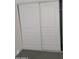 Bedroom closet featuring sliding doors and an organized storage space at 13839 N 33Rd St, Phoenix, AZ 85032