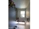 Spacious garage featuring natural lighting, ceiling fan, and ample storage space at 13839 N 33Rd St, Phoenix, AZ 85032