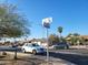 Street view displaying the home's neighborhood featuring cars parked along the sides of the roads at 13839 N 33Rd St, Phoenix, AZ 85032