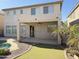 Backyard features covered patio, putting green, and access to the pool at 16823 S 27Th Ave, Phoenix, AZ 85045