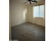 Bedroom featuring neutral color walls and tile flooring and window at 16823 S 27Th Ave, Phoenix, AZ 85045