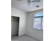 Carpeted bedroom featuring a window and sliding door closet at 16823 S 27Th Ave, Phoenix, AZ 85045