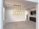 Bright dining room with modern lighting and views into the bar and stairs at 16823 S 27Th Ave, Phoenix, AZ 85045