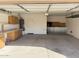 Spacious garage with built in cabinets and work area at 16823 S 27Th Ave, Phoenix, AZ 85045