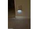 Hallway featuring carpeted flooring and a nightlight outlet at 16823 S 27Th Ave, Phoenix, AZ 85045