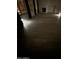 Open living room with a fireplace and wood floors at 16823 S 27Th Ave, Phoenix, AZ 85045