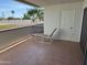 Covered patio includes tiled flooring and seating for outdoor enjoyment at 17404 N 99Th Ave # 136, Sun City, AZ 85373