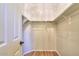 Spacious walk-in closet with ample shelving and hanging space for organized storage solutions at 18474 N Celis St, Maricopa, AZ 85138