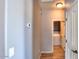 Hallway that leads to a laundry room at 18474 N Celis St, Maricopa, AZ 85138