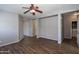 Spacious living room with laminate flooring and plenty of natural light at 18474 N Celis St, Maricopa, AZ 85138