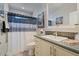Bathroom with shower-tub combo, gray tile backsplash, and modern sink at 2206 S Ellsworth Rd # 157B, Mesa, AZ 85209