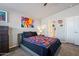 Comfortable bedroom featuring art and carpeted floors at 2206 S Ellsworth Rd # 157B, Mesa, AZ 85209