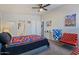 Bedroom featuring art, carpeted floors, and a ceiling fan at 2206 S Ellsworth Rd # 157B, Mesa, AZ 85209