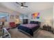 Spacious bedroom with ceiling fan, carpeted floors, and lots of natural light at 2206 S Ellsworth Rd # 157B, Mesa, AZ 85209