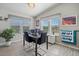 Bright dining room featuring contemporary furniture, large windows, and a cozy atmosphere at 2206 S Ellsworth Rd # 157B, Mesa, AZ 85209