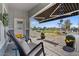 Relaxing porch with seating area, a retractable awning, and views of the community at 2206 S Ellsworth Rd # 157B, Mesa, AZ 85209