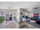 Bright kitchen with center island, barstool seating, and a cozy eat-in dining area at 2206 S Ellsworth Rd # 157B, Mesa, AZ 85209