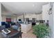 Stylish kitchen offering white cabinetry, stainless appliances, and a large island with seating at 2206 S Ellsworth Rd # 157B, Mesa, AZ 85209