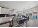 Modern kitchen with a large island, stainless appliances, and sleek, dark countertops at 2206 S Ellsworth Rd # 157B, Mesa, AZ 85209