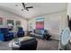 Bright living area with plush seating, contemporary artwork, and an open layout at 2206 S Ellsworth Rd # 157B, Mesa, AZ 85209