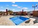 A small pool with a patio set and a grill, surrounded by a brick wall at 2206 S Ellsworth Rd # 157B, Mesa, AZ 85209