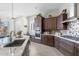 Well-appointed kitchen with granite countertops, stainless steel appliances, and ample cabinet space at 26774 W Piute Ave, Buckeye, AZ 85396