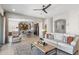 Spacious living room with an open layout, connecting to the kitchen and dining areas at 26774 W Piute Ave, Buckeye, AZ 85396