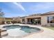 Inviting backyard pool and patio area, perfect for outdoor entertaining and relaxation at 26774 W Piute Ave, Buckeye, AZ 85396