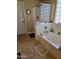 Elegant bathroom featuring a soaking tub, glass-enclosed shower, and a neutral color palette for a spa-like ambiance at 32071 N Chestnut Trl, San Tan Valley, AZ 85143