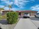 Lovely single-story home featuring a three-car garage and well-maintained landscaping for enhanced curb appeal at 32071 N Chestnut Trl, San Tan Valley, AZ 85143
