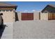 The property features a private gate to access the home with extra space for parking at 32071 N Chestnut Trl, San Tan Valley, AZ 85143